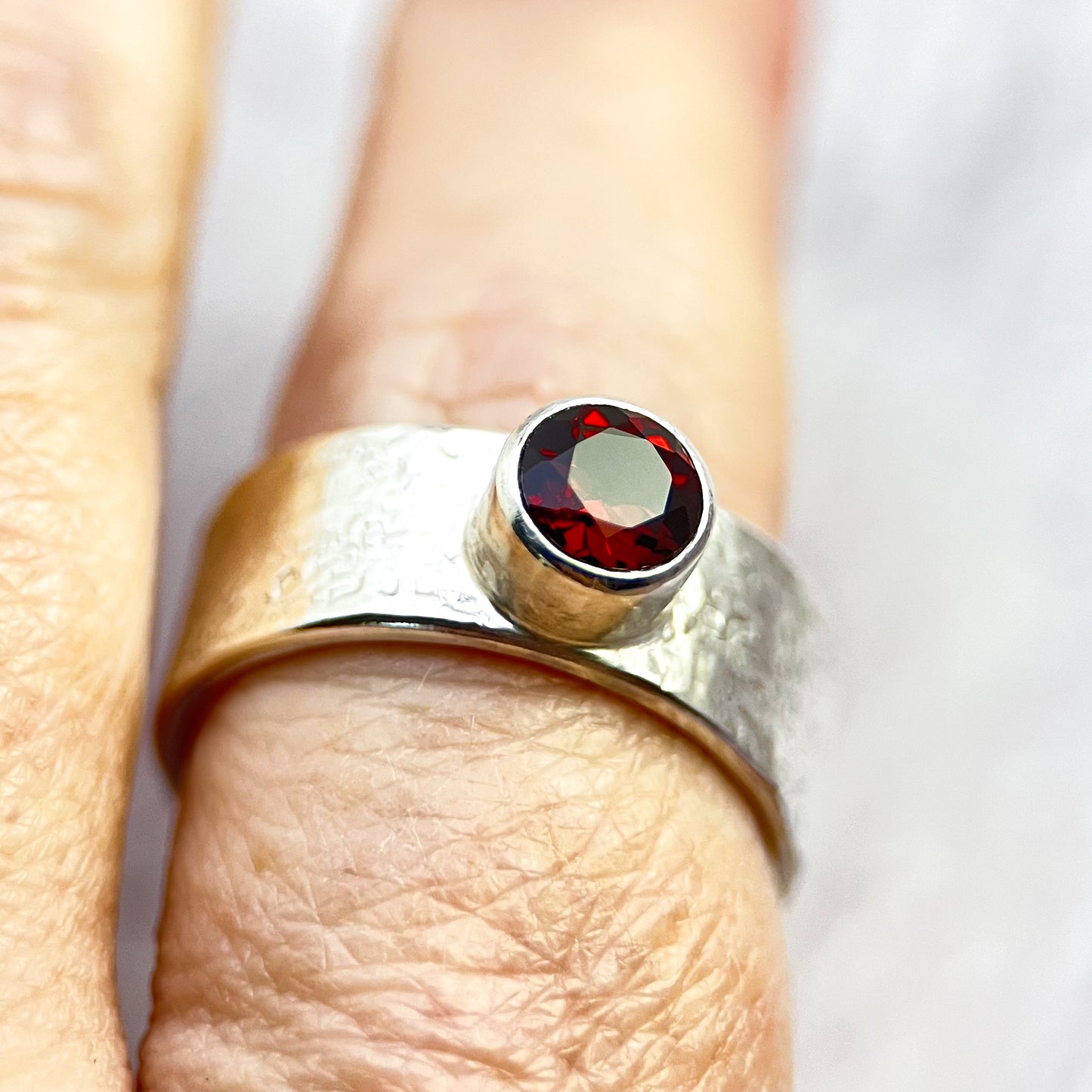 Crimson Crest Ring – Faceted Garnet on Silk-Textured Sterling Silver Band (Size 9+)