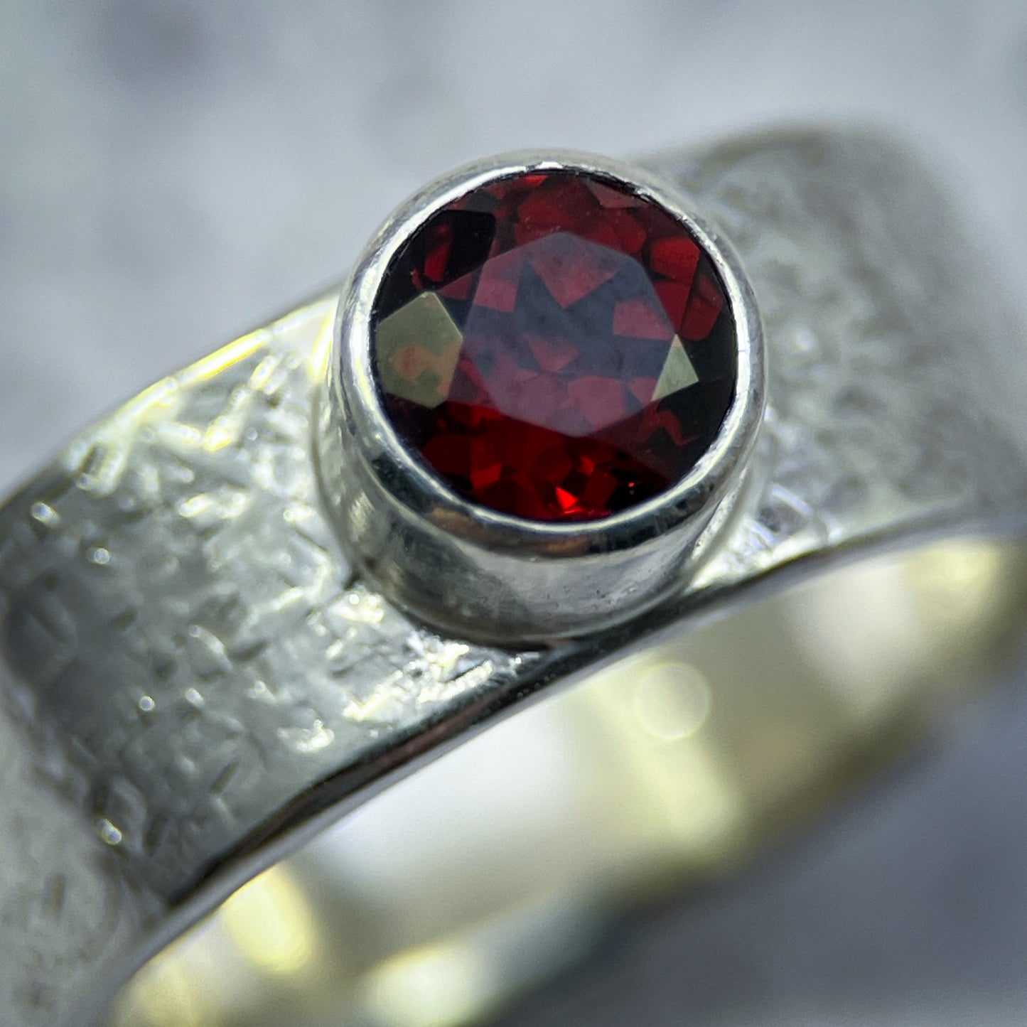 Crimson Crest Ring – Faceted Garnet on Silk-Textured Sterling Silver Band (Size 9+)
