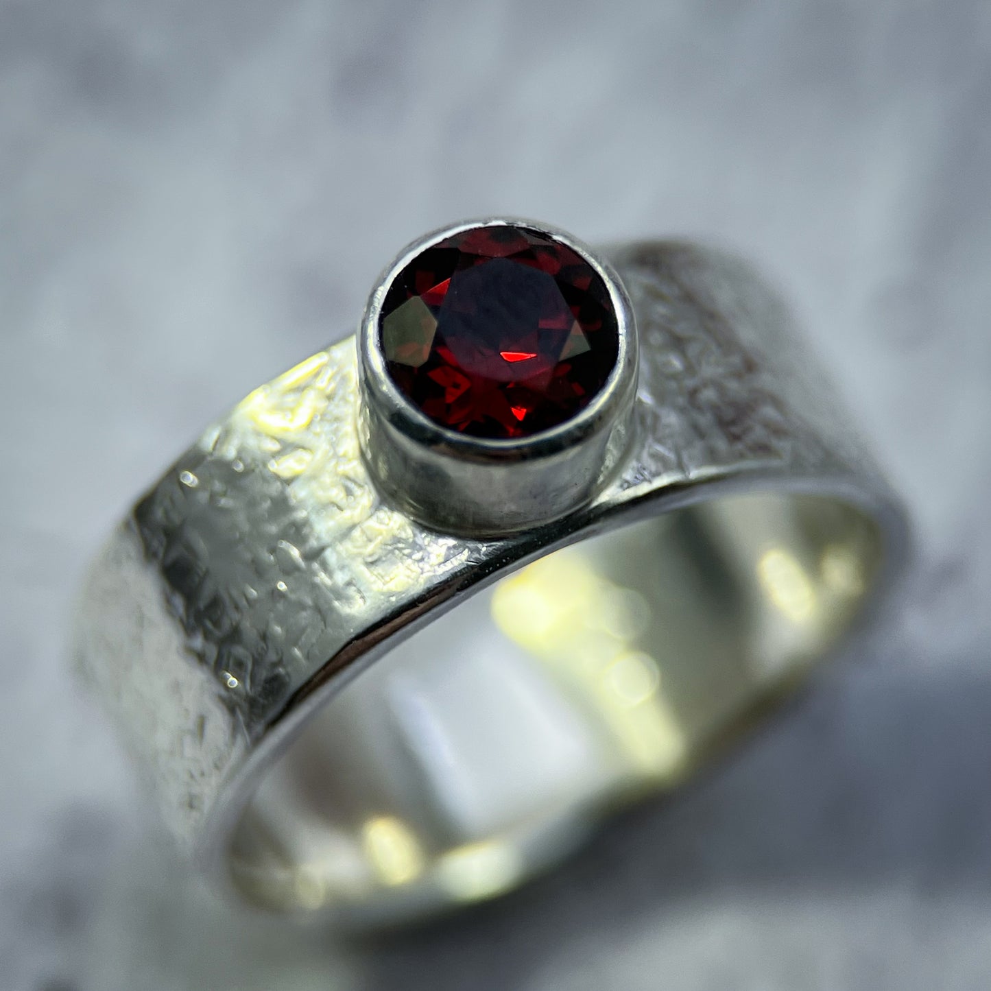 Crimson Crest Ring – Faceted Garnet on Silk-Textured Sterling Silver Band (Size 9+)