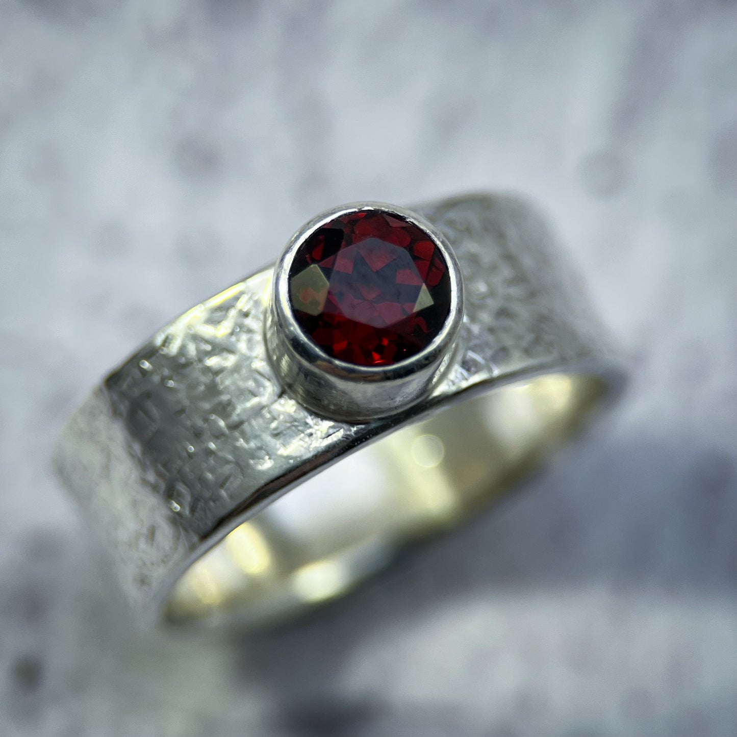 Crimson Crest Ring – Faceted Garnet on Silk-Textured Sterling Silver Band (Size 9+)